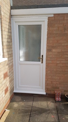 White upvc back door made - upvc,